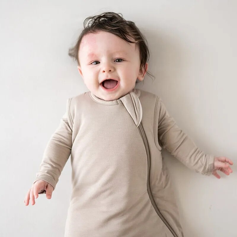 Babies in sleeveless bamboo fibre sleep sacks - Koko Mee