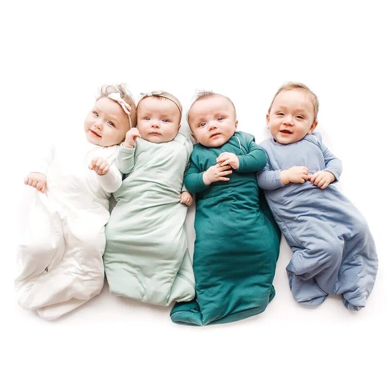 Babies in sleeveless bamboo fibre sleep sacks - Koko Mee